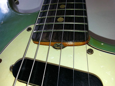 pickup closeup with truss rod adjustment